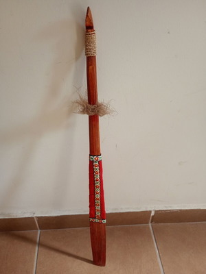 Vintage wooden decorative part of traditional bow, used