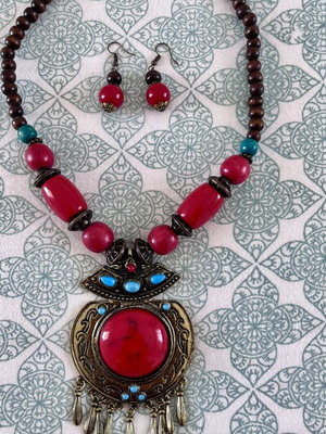 Jewelry set with blue and red stones and beads