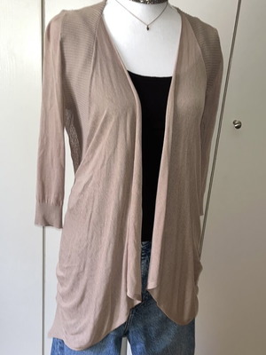 Beige cardigan like new one size with perforated design