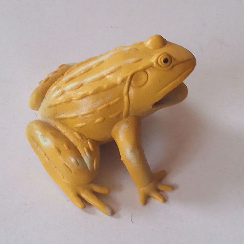 Frog figure used, orange and yellow