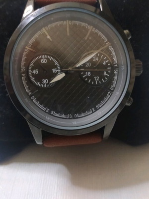 Men's watch new with brown suede strap and black dial