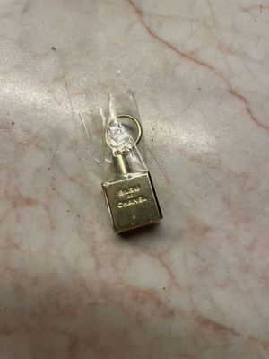 Chanel keychain new, gold color