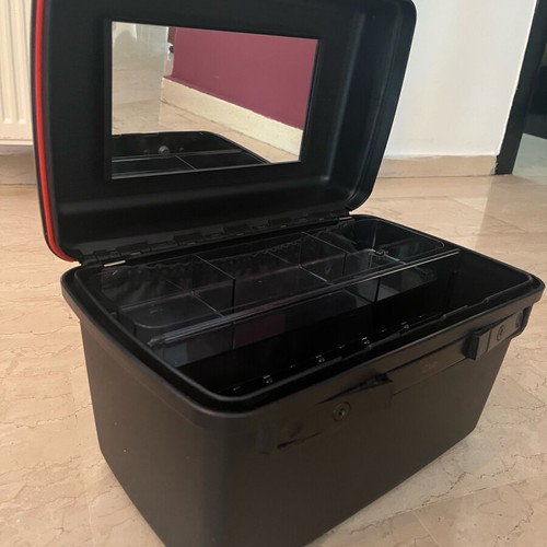 Delsey travel makeup case like new, sturdy black with inner pockets