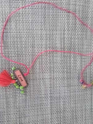 Handmade red pendant with adjustable cord