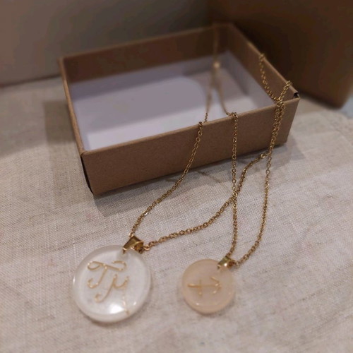 Double pendant with monograms and Sagittarius symbol new