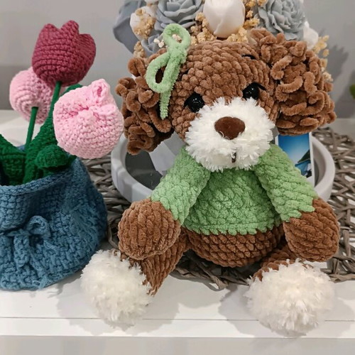 Handmade crocheted dog new with plush yarn and green dress
