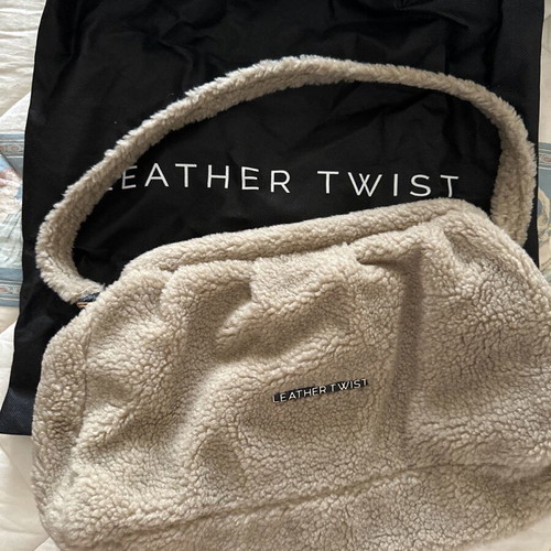 Leather twist clutch new, large beige fluffy with detachable strap
