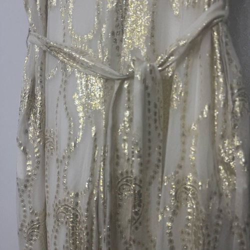 Overall jumpsuit with a belt.