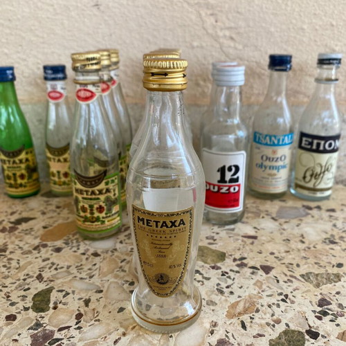 Collectible vintage miniature bottles used, set of 15, Metaxa and Ouzo