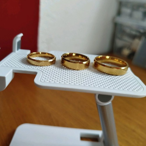 Set of new stainless steel rings, two women's and one men's