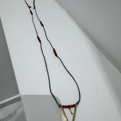 Handmade boho-vintage necklace with gold detail and pearl