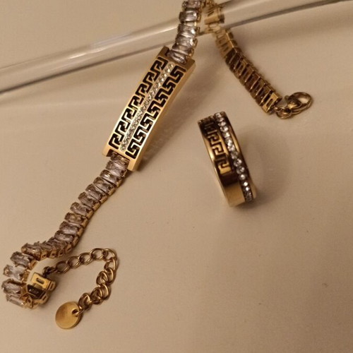 Bracelet and ring set made of steel with archaic design and rhinestones, new, gold