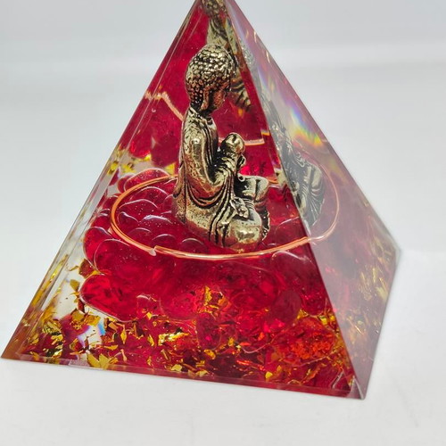 Orgonite pyramid with Buddha and red quartz like new