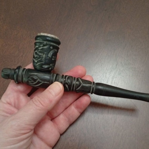Handmade carved wooden pipe with stone inlay