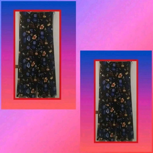 Pants in shades of blue with beautiful pattern, like new