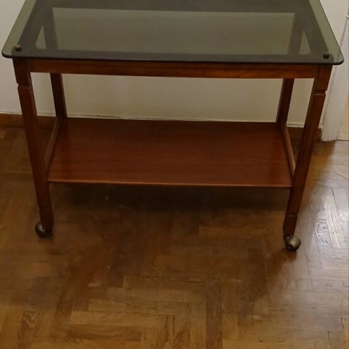 TV stand used with wheels and dark glass
