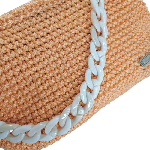 Knitted clutch bag new in salmon color with acrylic chain