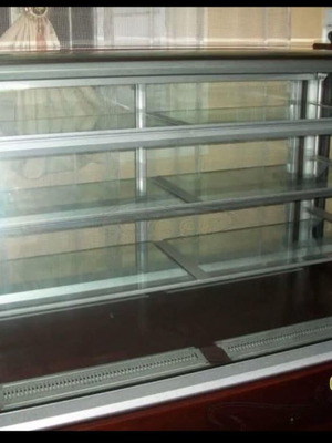 Pastry display case like new with free checkout counter