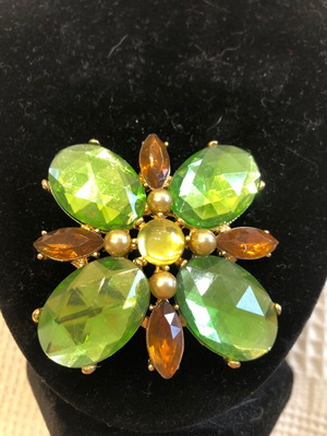 Flower pin with green and brown stones like new