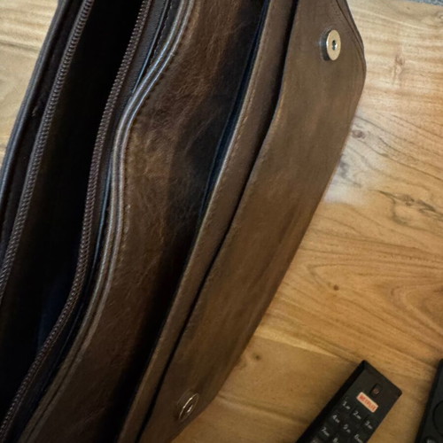 Brown shoulder bag used with multiple pockets