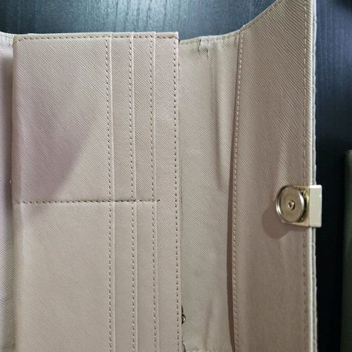 Wallet used beige with small signs of wear