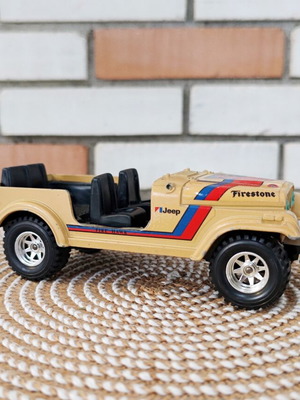 Jeep CJ-7 Bburago 1:24 diecast model with Firestone graphics