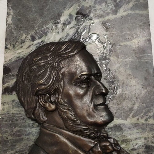 Vintage brass embossed Richard Wagner portrait on green marble used