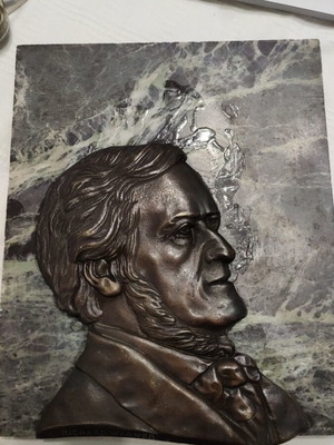Vintage brass embossed Richard Wagner portrait on green marble used