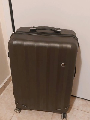 Hard travel suitcase used, gray silver, with wheels