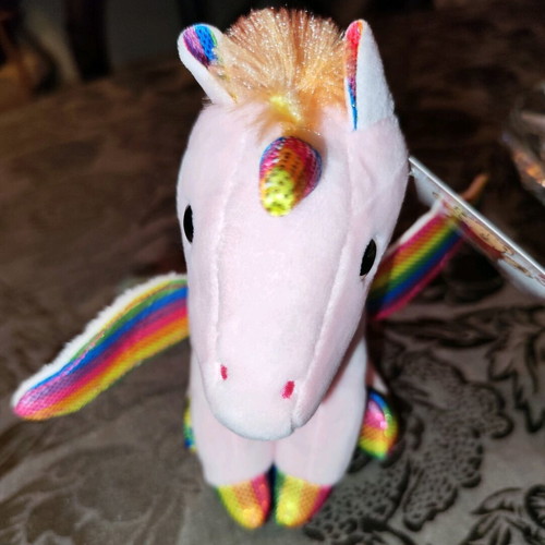 Plush unicorn sitting pink with colorful wings mane and tail new
