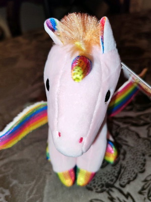 Plush unicorn sitting pink with colorful wings mane and tail new