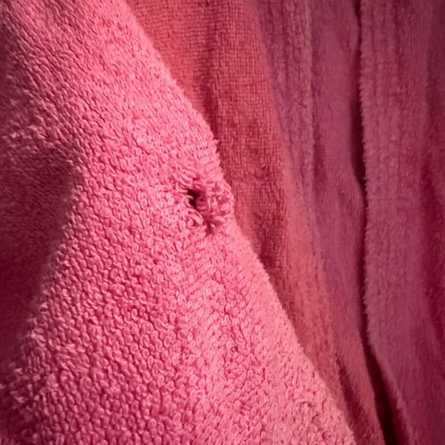 Bathrobes used, pink with hood and blue