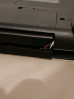 Toshiba laptop l450d used for parts with broken hinge