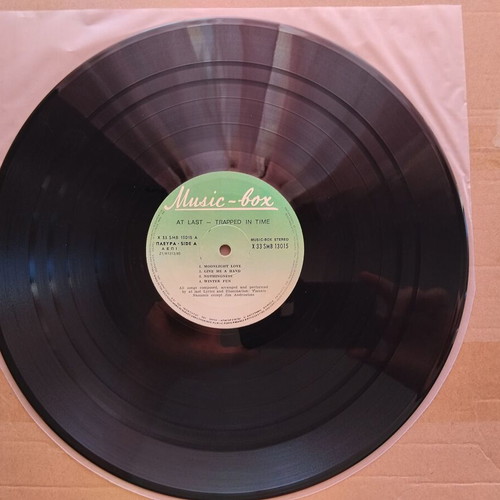 At Last Trapped In Time LP used, rock