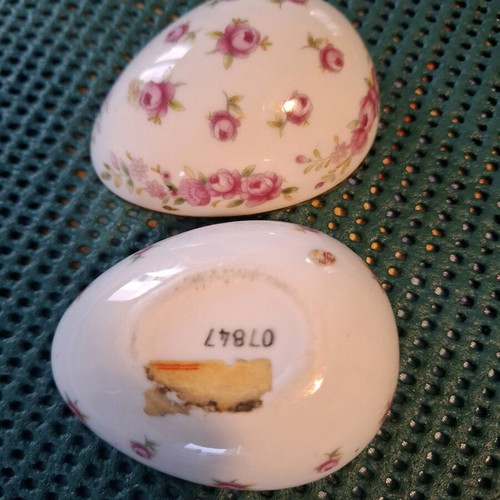 Porcelain decorative container used, small egg with pink flowers