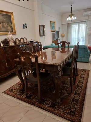Dining table set like new with chairs and buffet