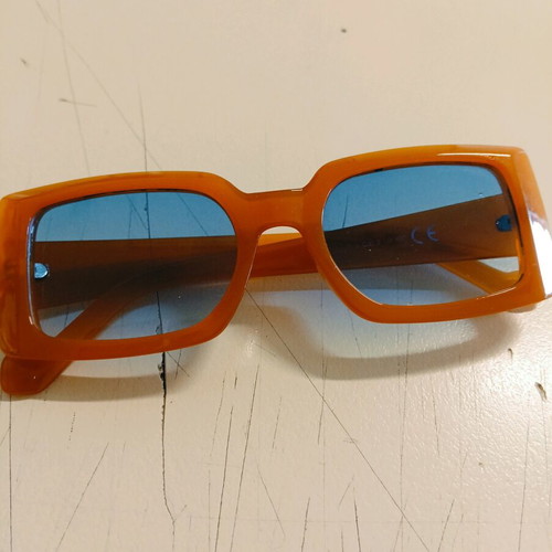 Pervedere two pairs of sunglasses like new, beige and orange