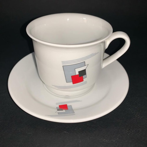 Ionia porcelain cup used with two saucers