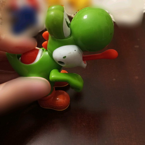 Children's toy like new with red button and tongue