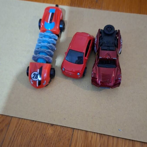 Red toy car set used for endless fun