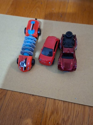 Red toy car set used for endless fun