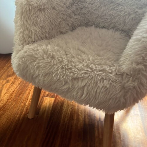 Armchair with faux fur upholstery