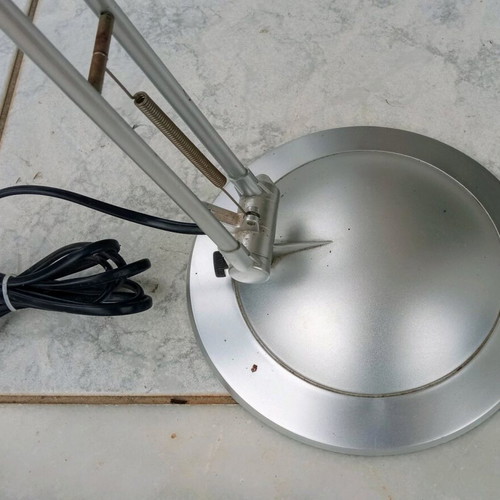 Desk lamp used with adjustable arms and On Off switch