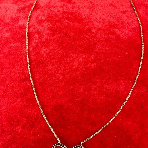 Silver 925 necklace with gold vermeil coating, infinity design with gold hearts, used