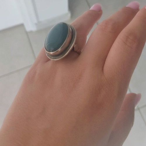 Silver large ring with petrol oval stone used