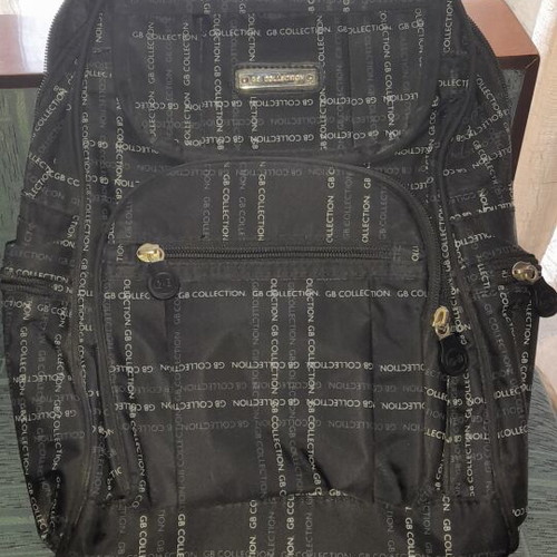 Backpack with multiple compartments, like new, black