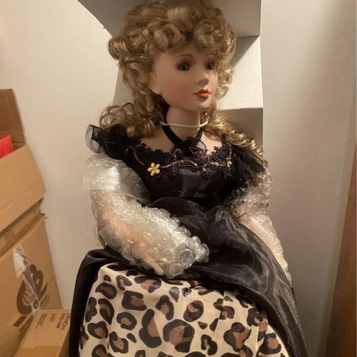 Porcelain decorative doll with light like new