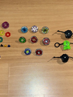 Beyblade collection like new with 8 complete sets and extra parts