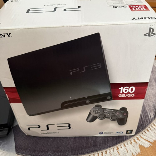 Sony PlayStation 3 Slim 160GB console used with original controller