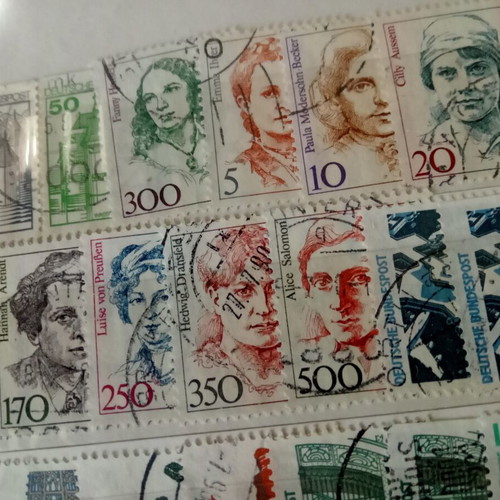 Stamp album with some stamps, mostly cancelled